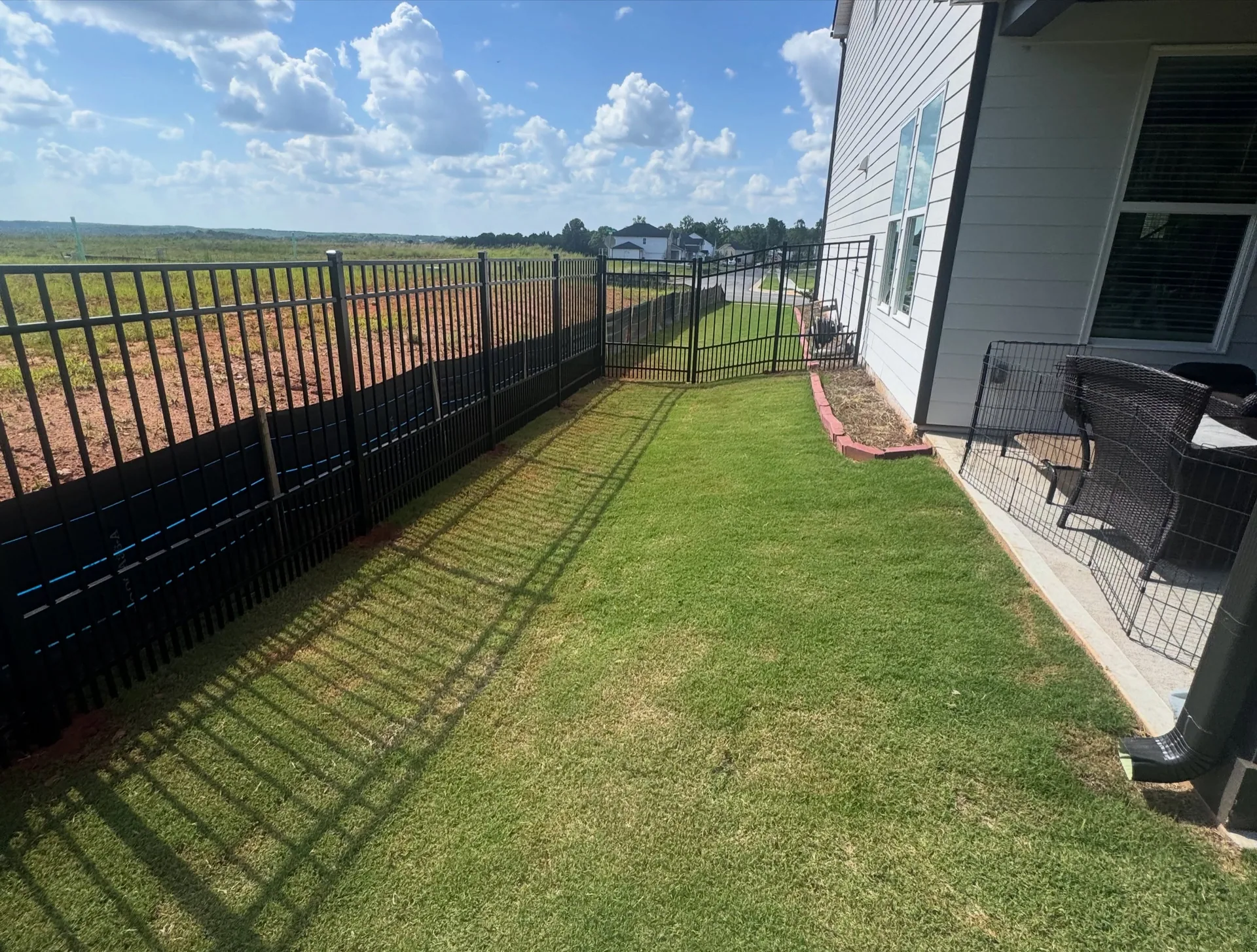 Black aluminum fence sod side yard gate monroe, GA
